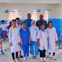 Students dressed as doctors for career day