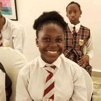 Smiling college students in uniform